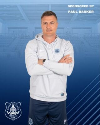 Paul Barker, Bishop Auckland FC sponsored by, football manager, sports director, in a white hoodie at the stadium, promoting the team, non-league football, Northern League, grassroots football.