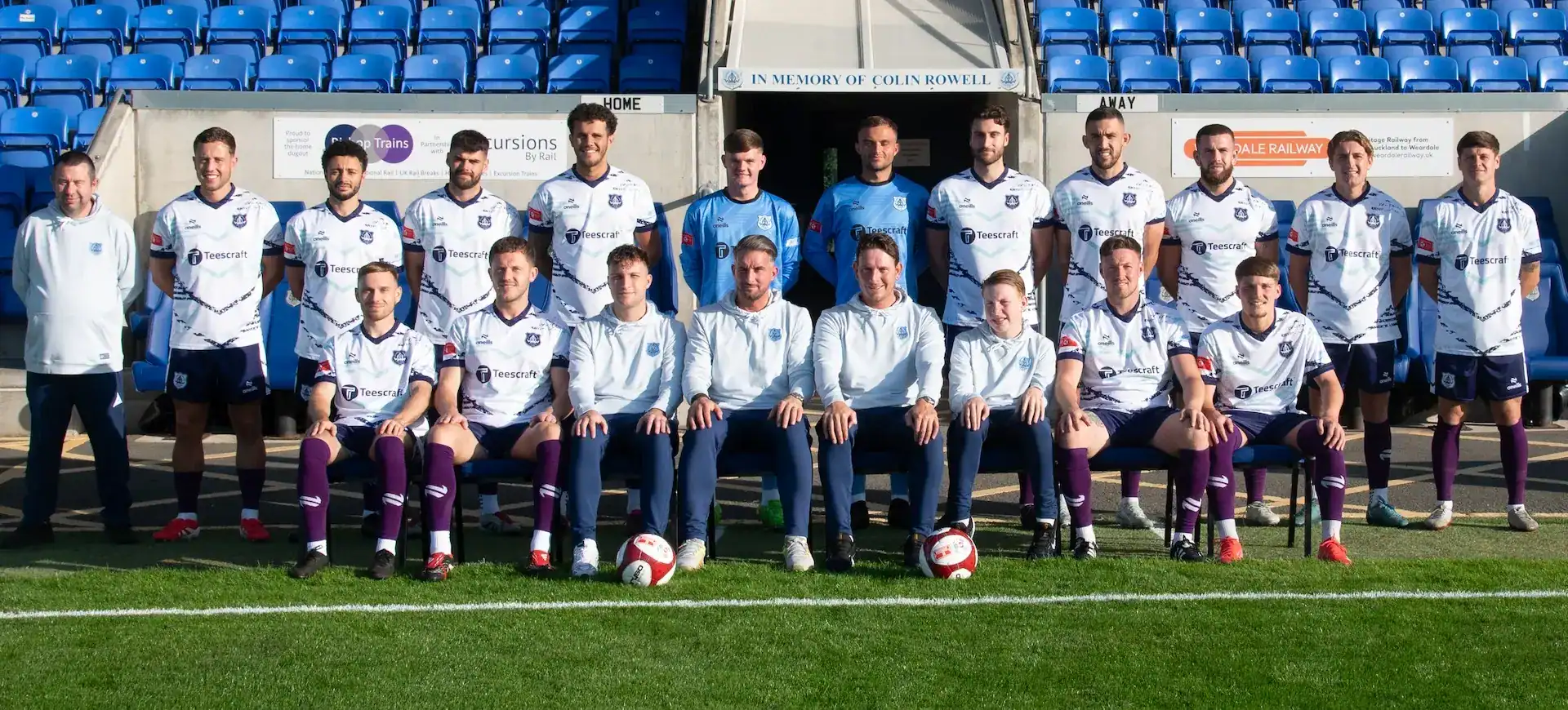 Bishop Auckland FC team photo on the football pitch showcasing players and staff in their kit. Pride in local football club, team spirit, and community support highlighted in the image.